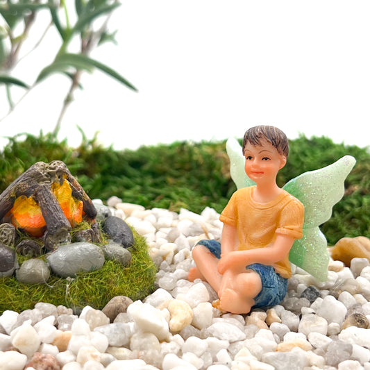 Fairy Oliver fairy garen figurine. Sitting boy fairy with green wings.