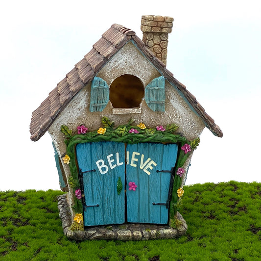 Fairy Garden Believe House. Fairy garden house set with large blue opening doors and to scale table and chair set.
