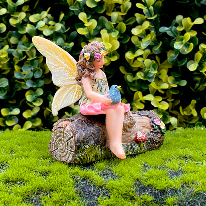 Fairy Anna Sitting On A Log