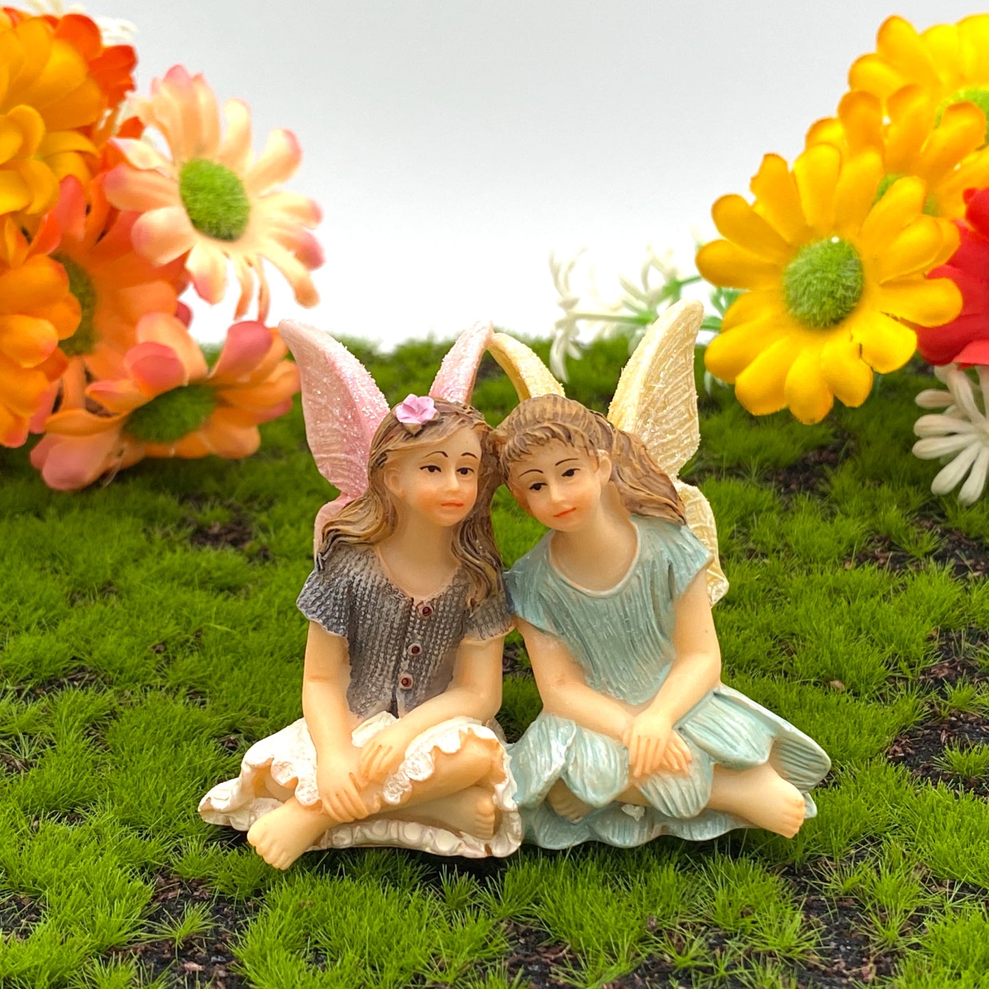 Best friend fairies.  Two girl fairies small figures  side by side 